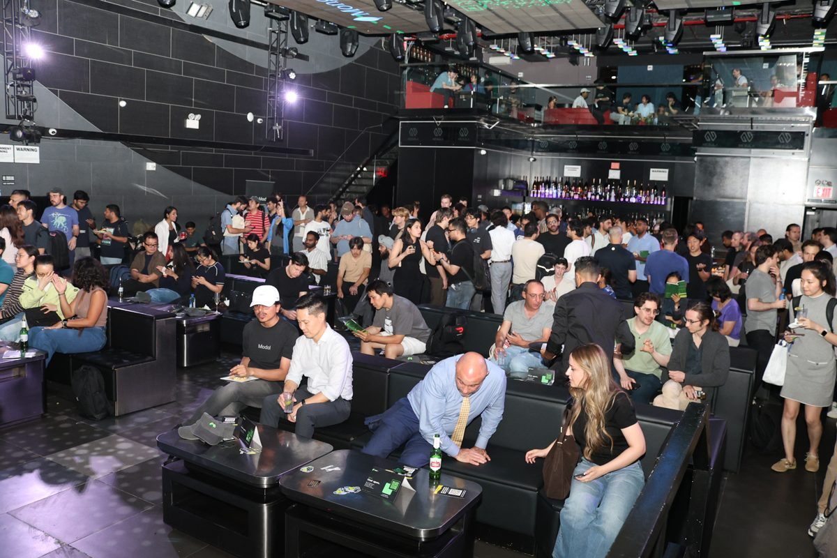 Seated audience filling the room